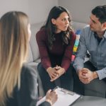 Expecting couple on home counselling meeting