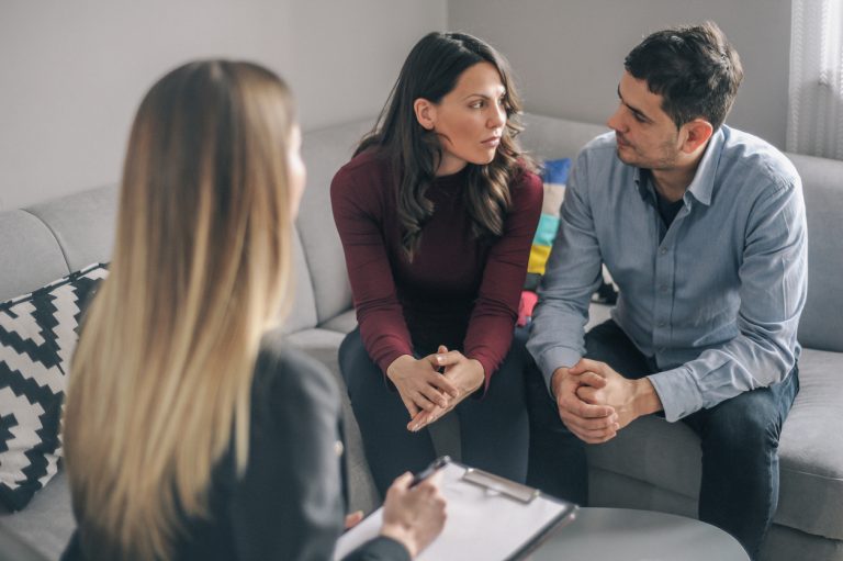 Expecting couple on home counselling meeting